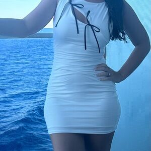 Fitted White Dress with Black bow Detail